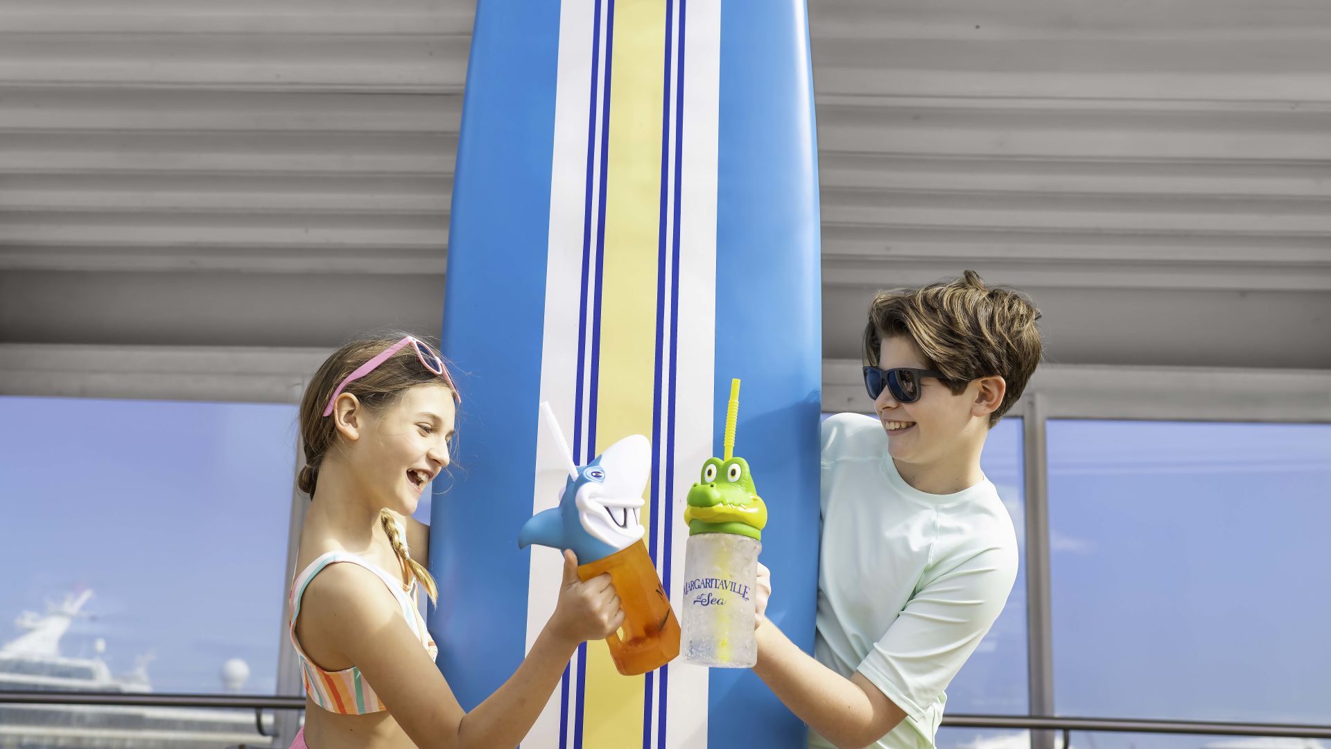 A Man And Woman Holding A Toy