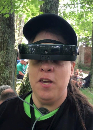 Bambie Parsons is seen wearing her eSight glasses for the visually impaired at a rock concert