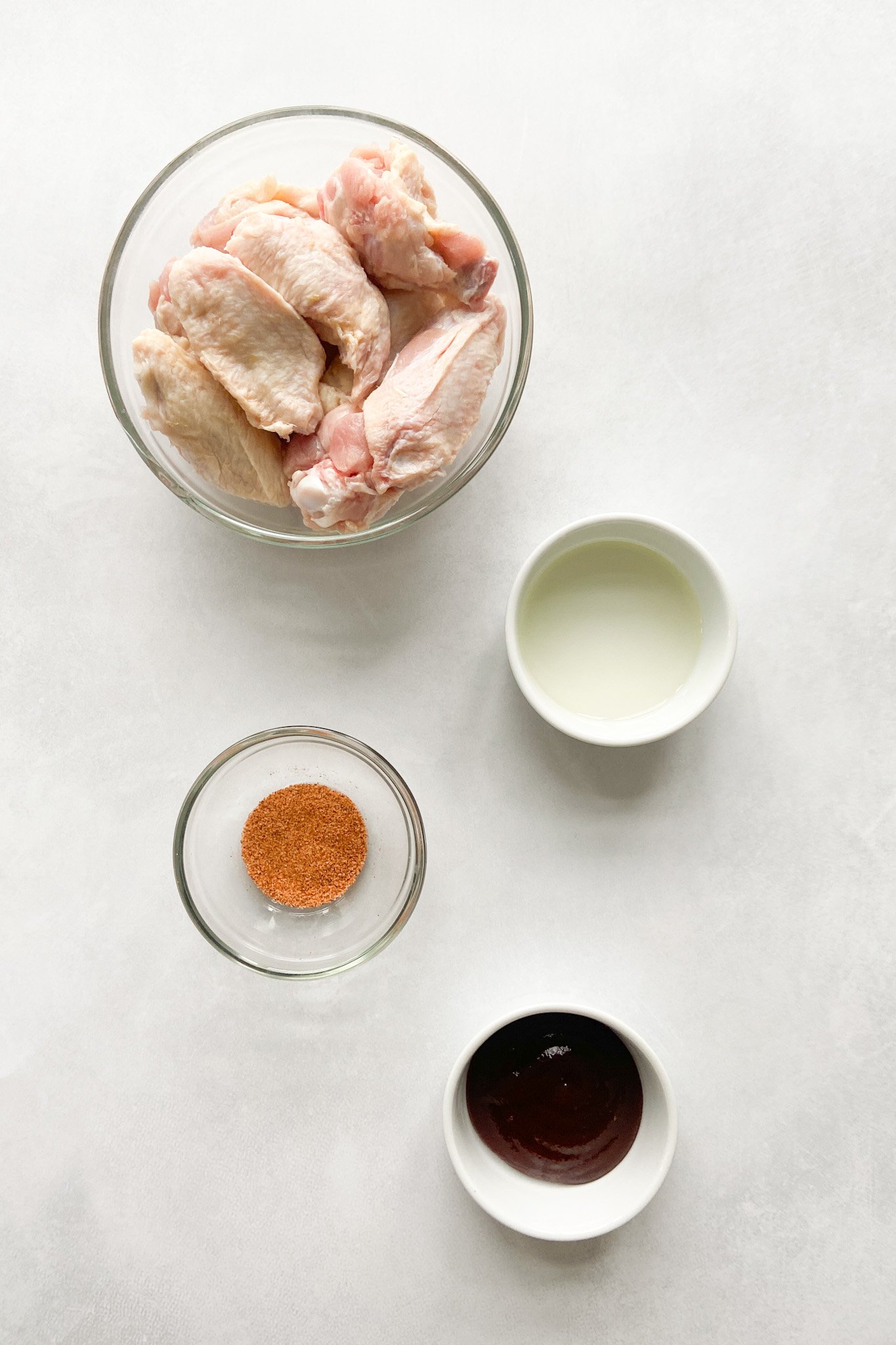 Ingredients to make chicken wings. Specifics provided in recipe card.