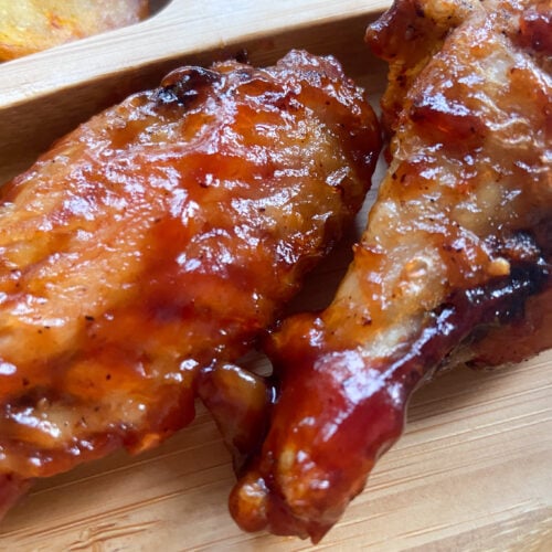 Chicken wings served on a bamboo plate