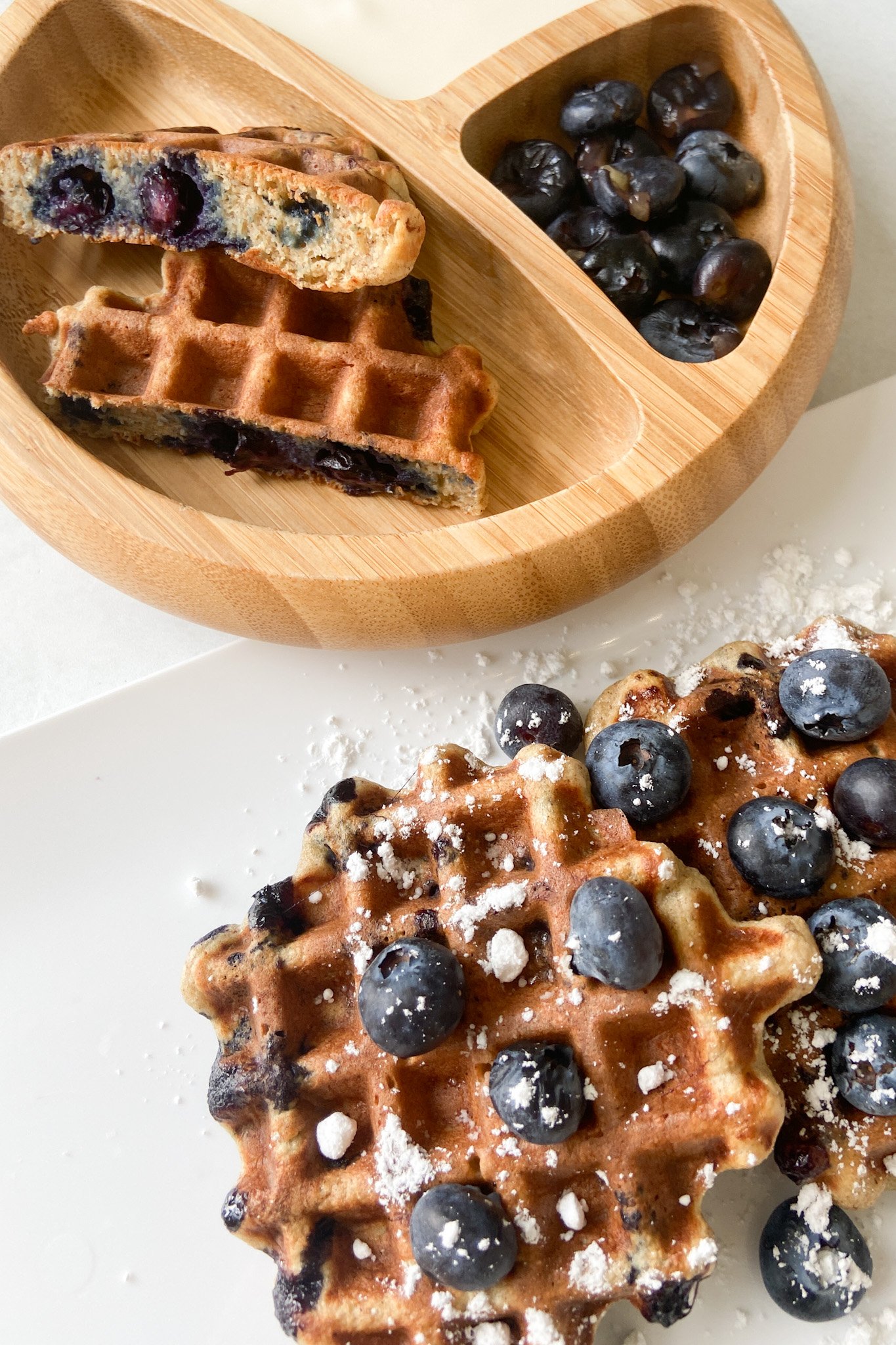 Blueberry banana waffles served with blueberries
