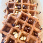 Banana oat waffles with chocolate chips and pecans