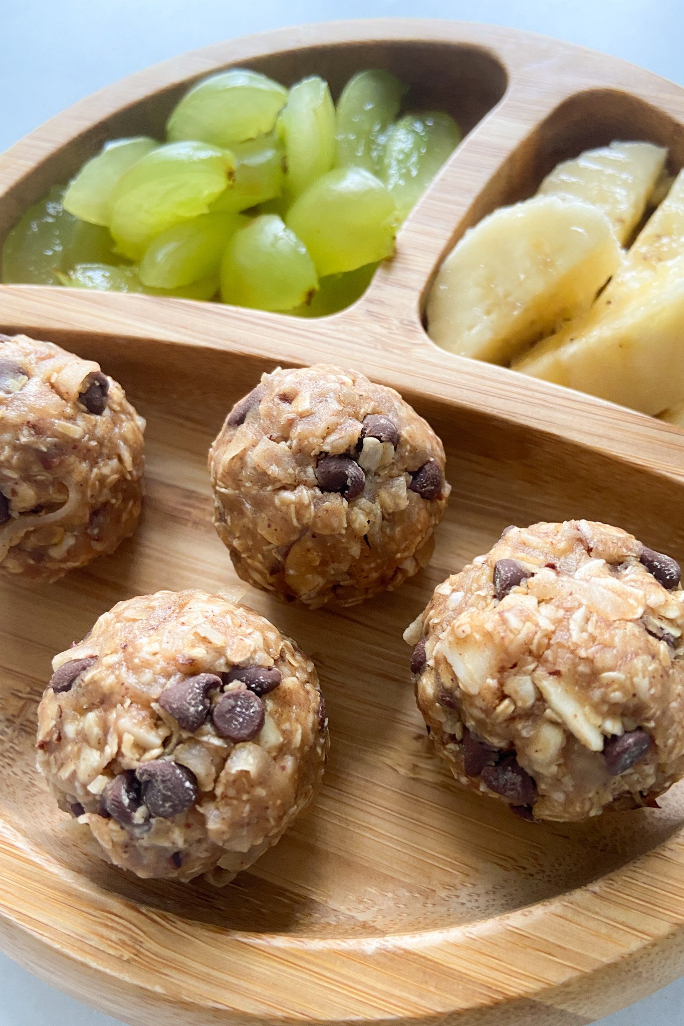 Granola balls served with fruits