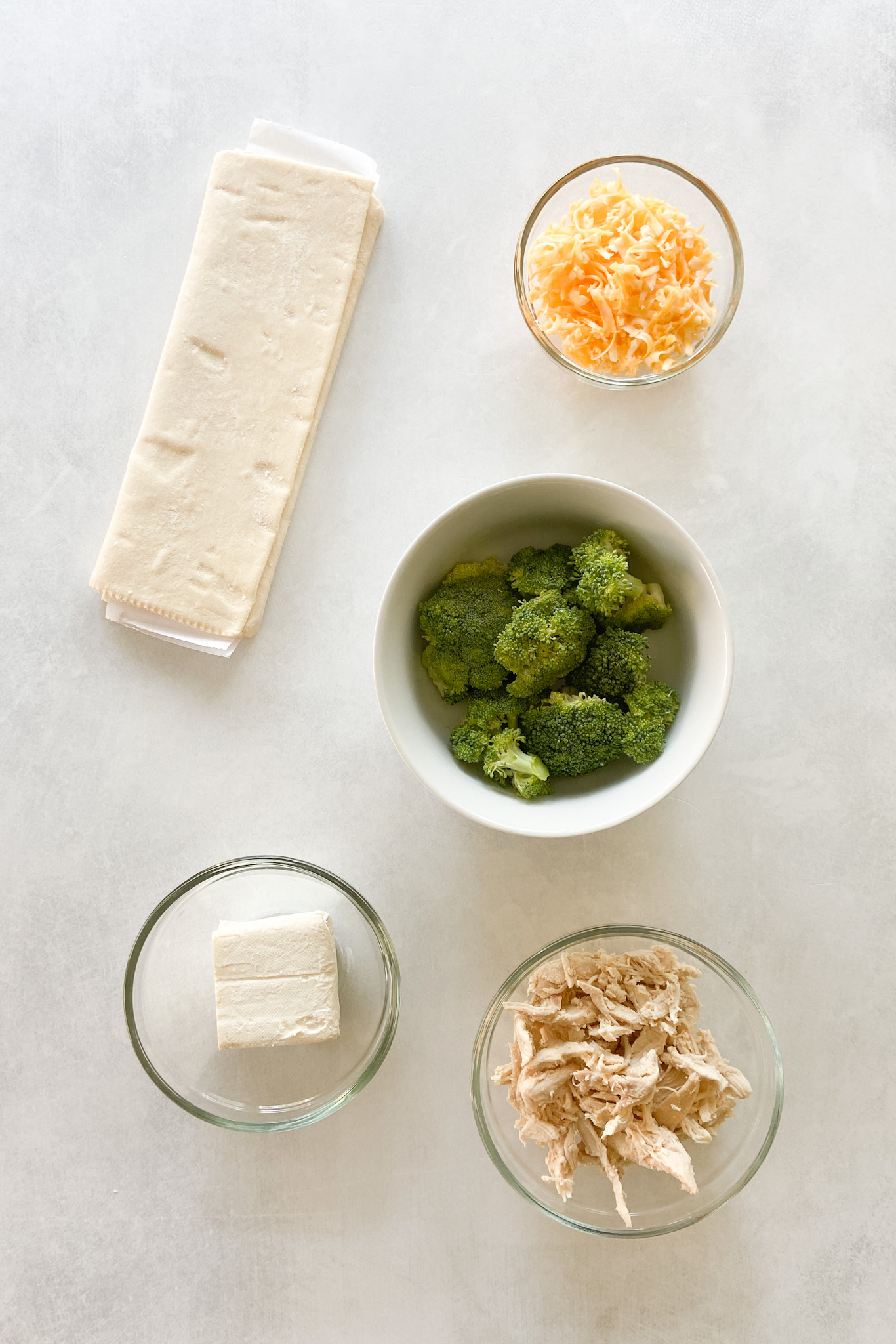 Ingredients to make broccoli and cheese pinwheels.