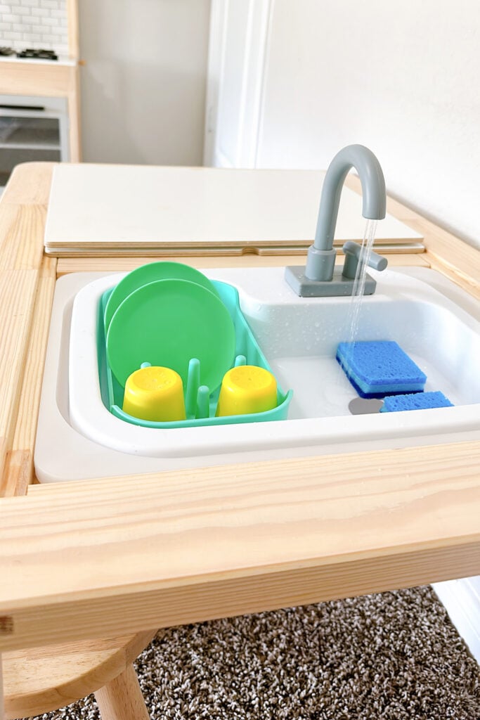 Lovevery play sink with Ikea Flisat table.