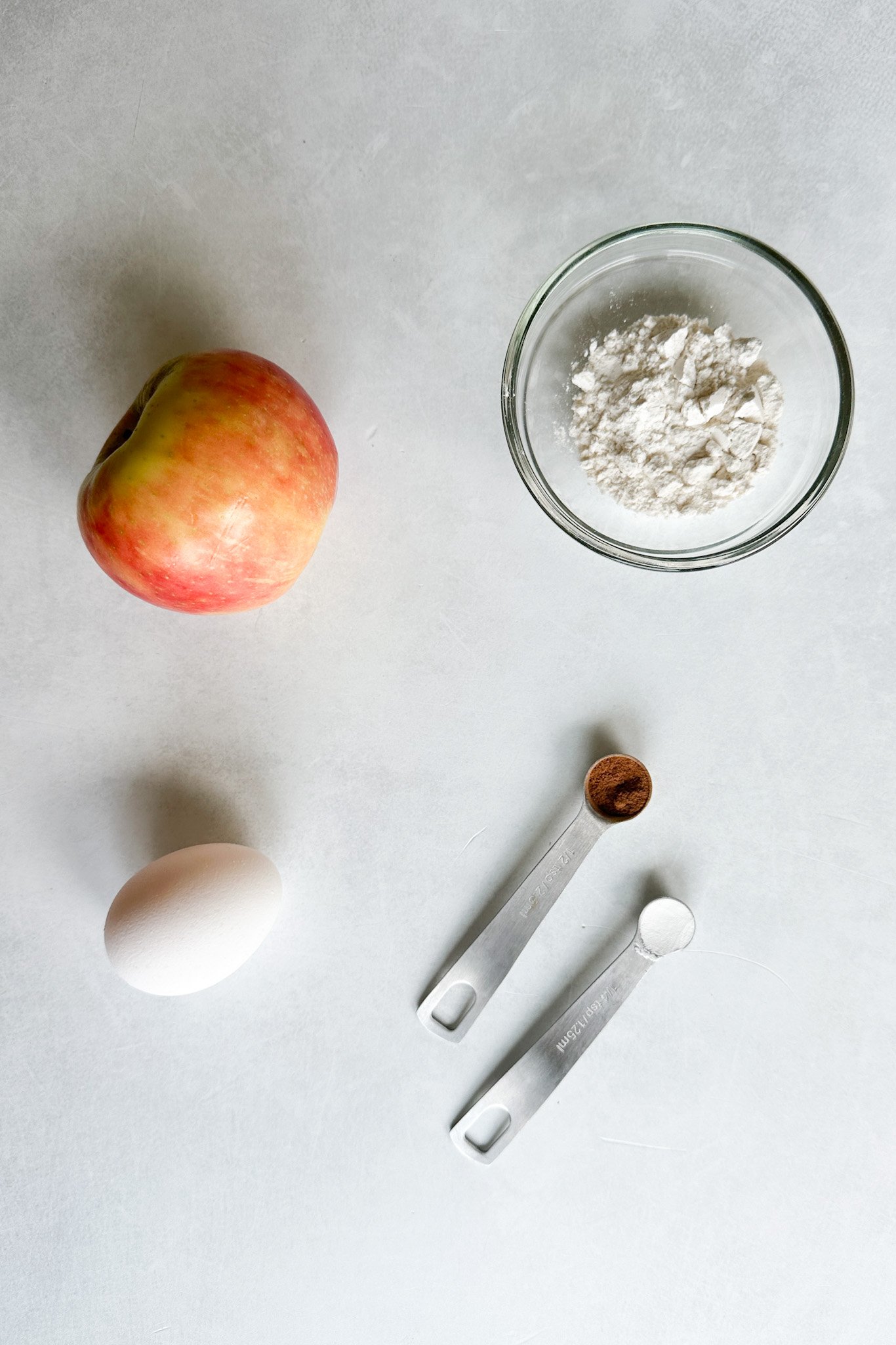 Ingredients to make apple fritters.