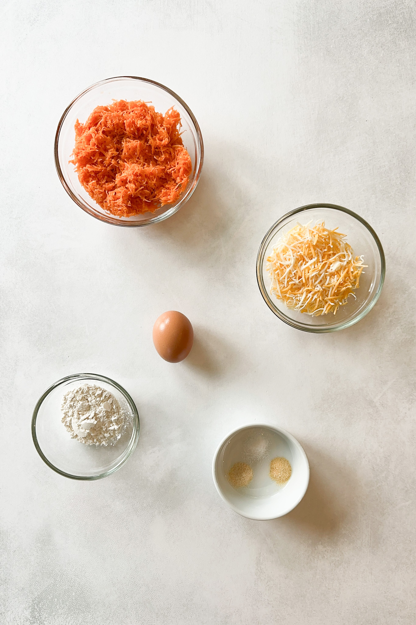 Ingredients to make carrot fritters.