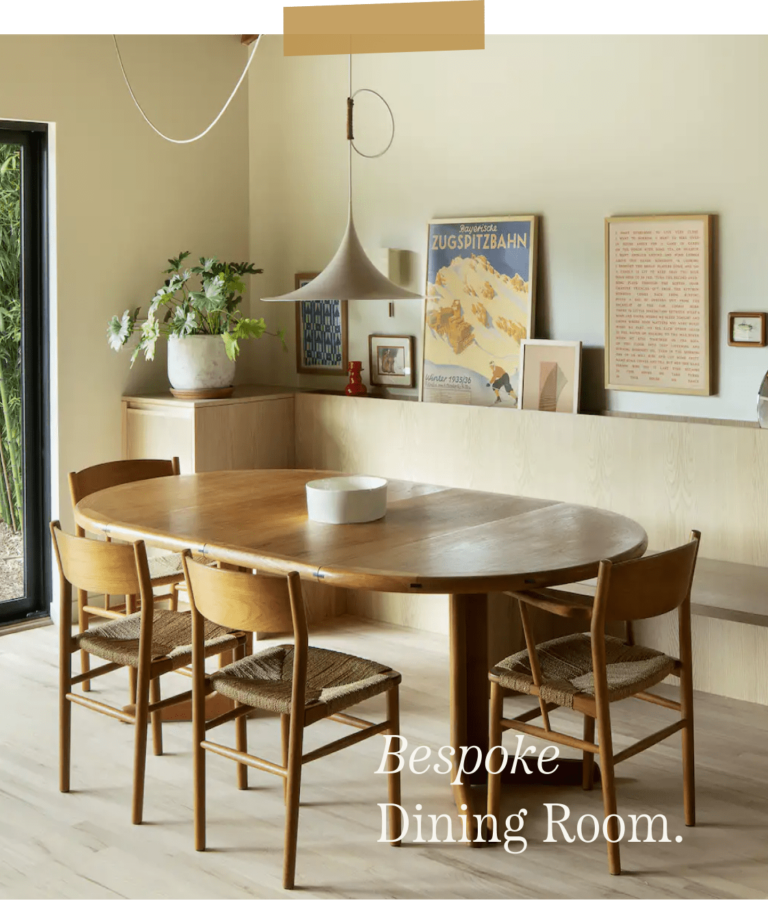Dining room table with six dining chairs, a ceiling lamp, wall art and plants