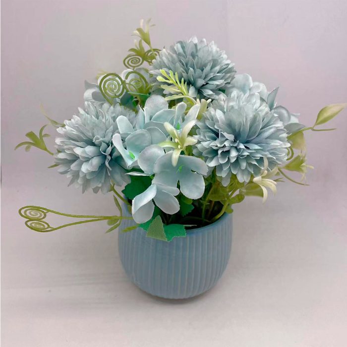 Maceta con flores azules - Galerías el Triunfo - 291001736602