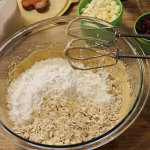 Step 5 - Mix in the flour followed by the old-fashioned oats, mixing until combined.