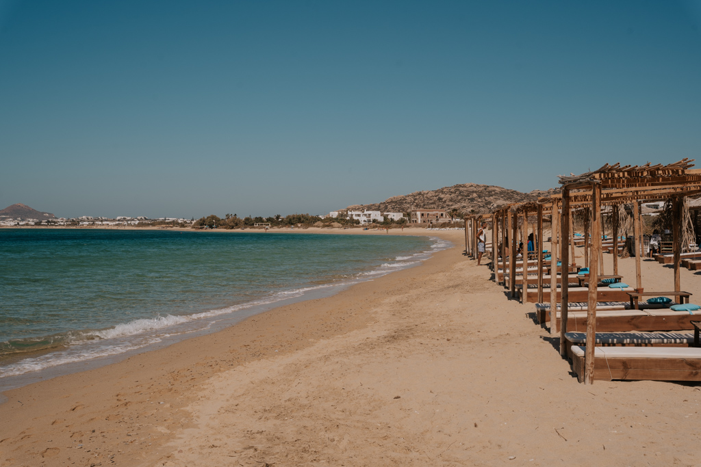 gold sand and blue water at Plaka Beach, Naxos Chora