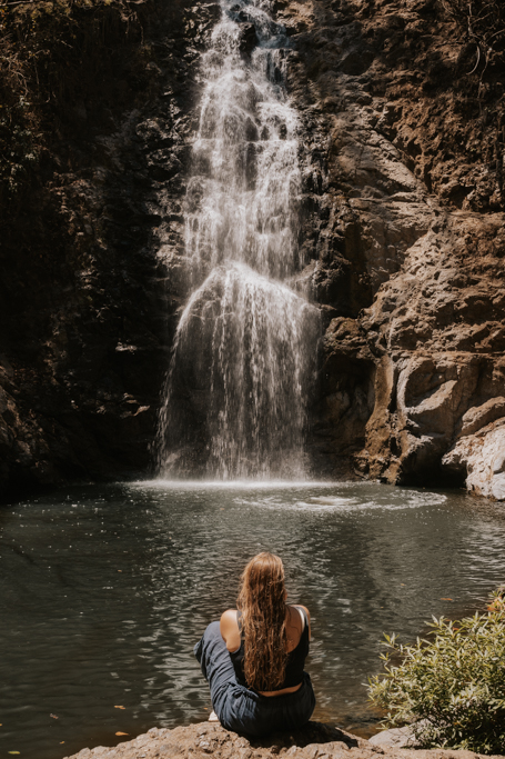 girl looking at Montezuma waterfall