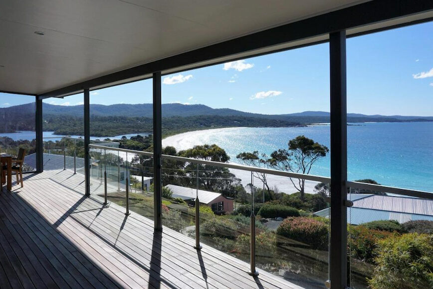 accommodation bay of fires tas with stunning blue ocean through floor to ceiling windows