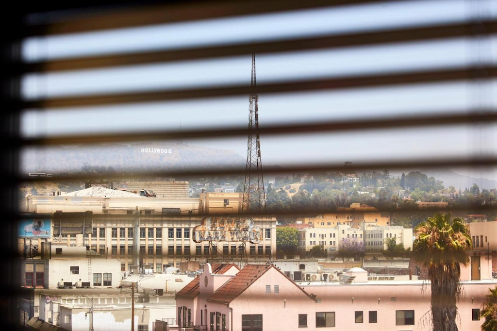 Hollywood skyline through curtain blinds at the best hotels in Hollywood California