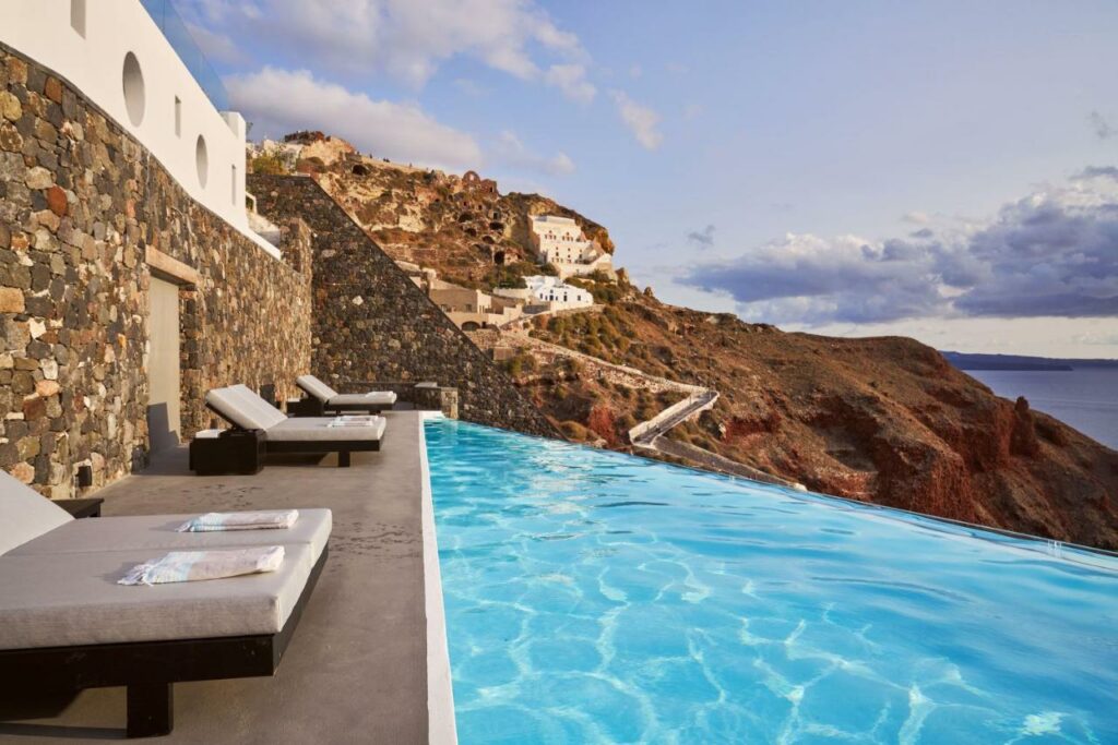 Zigzag road in Santorini - a view from the pool deck in Charisma Suites