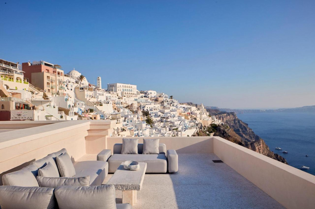 A view from the upper deck of one of the hotels in Santorini with the glimpse of the island