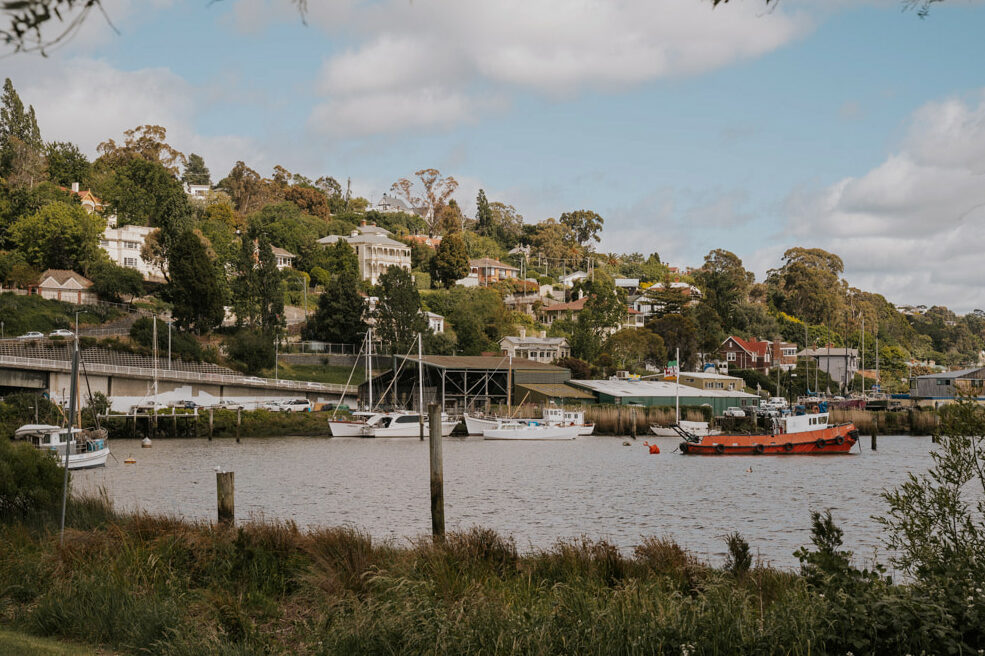 An orange boat on the Tamar River easily reachable from Launceston boutique hotels