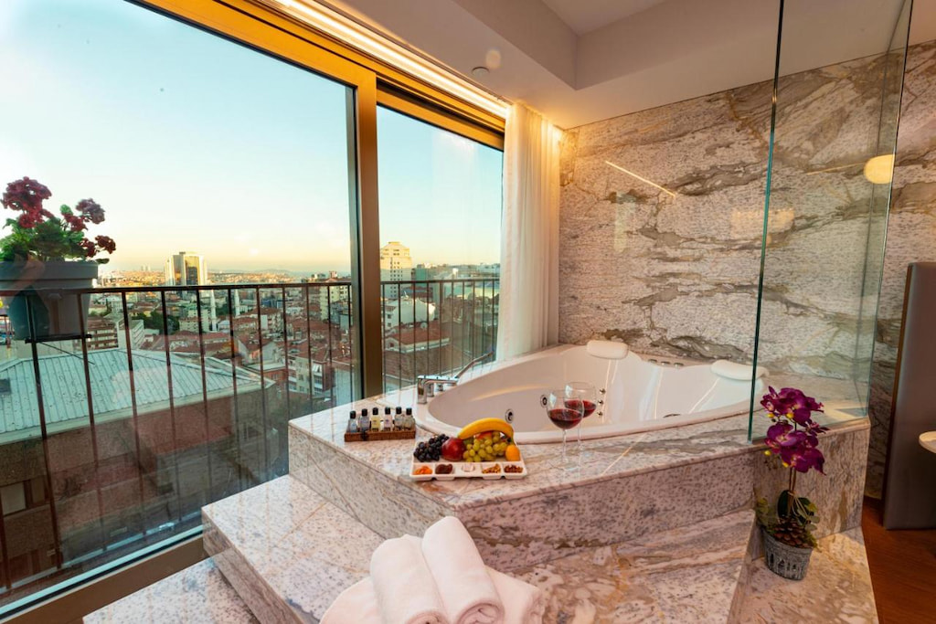 A jacuzzi with the view of the city