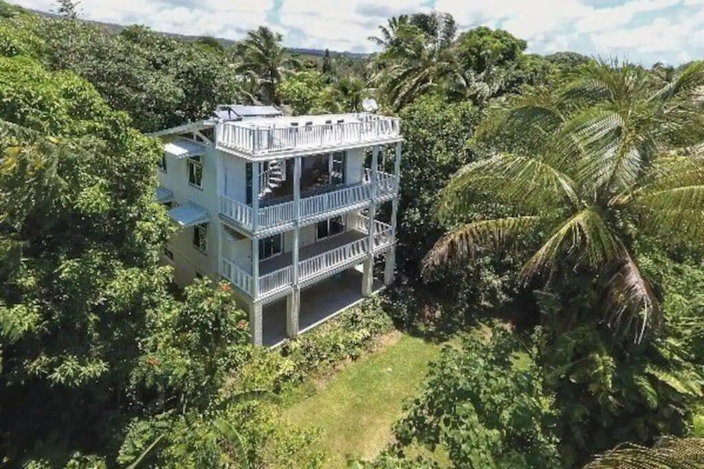 Aerial view of the Peaceful Kehena Beach Treehouse surrounded by trees