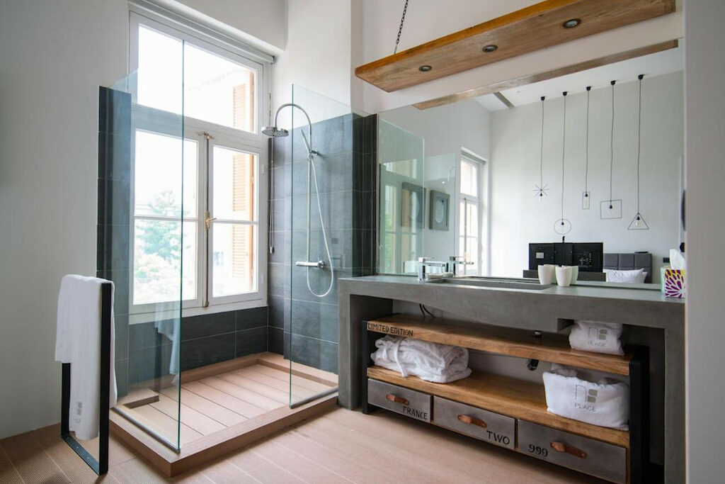 View from the bathroom with a shower area with glass divider