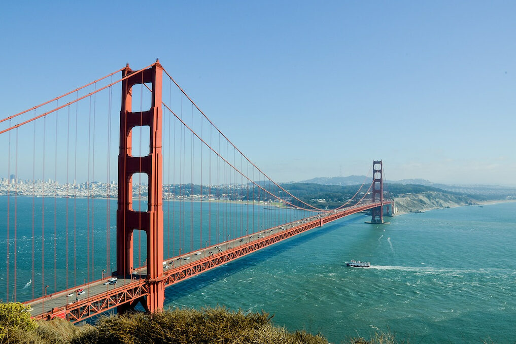 the best Golden Gate Bridge quotes with a red bridge and blue water