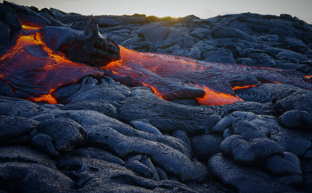 hawaii lava puns with fiery volcano and black ash