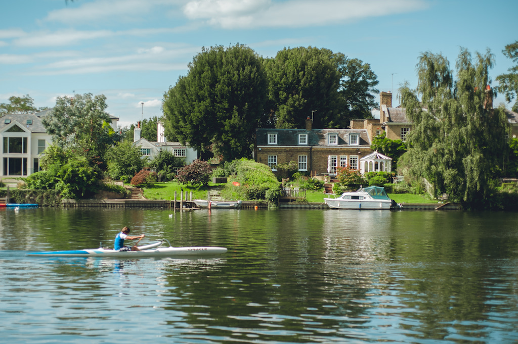 man rowing on the River Thames in England captions