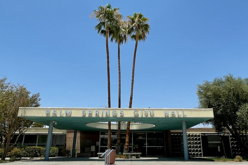 Palm Springs city hall with palm tree quotes above