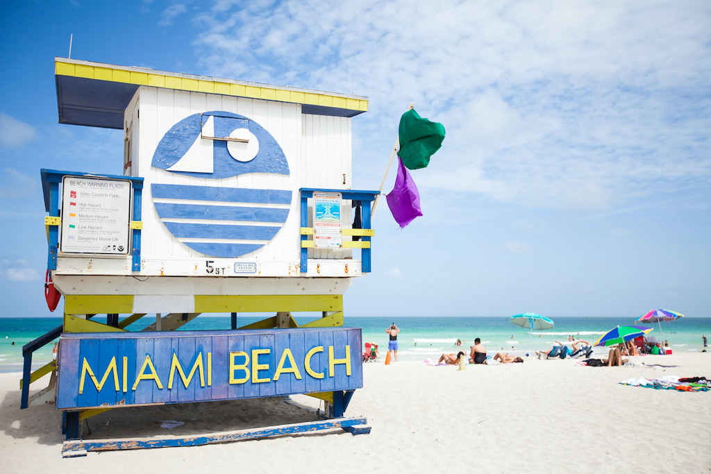hut at Miami Beach with white sand and turquoise water in Miami quotes