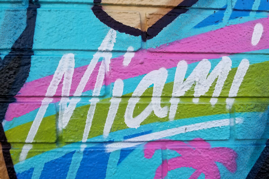 colorful graffiti that says Miami puns