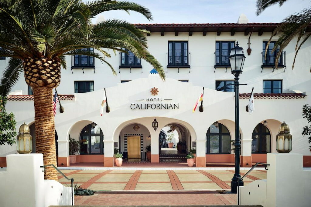 The entrance of the Hotel Californian with a spacious area in front.