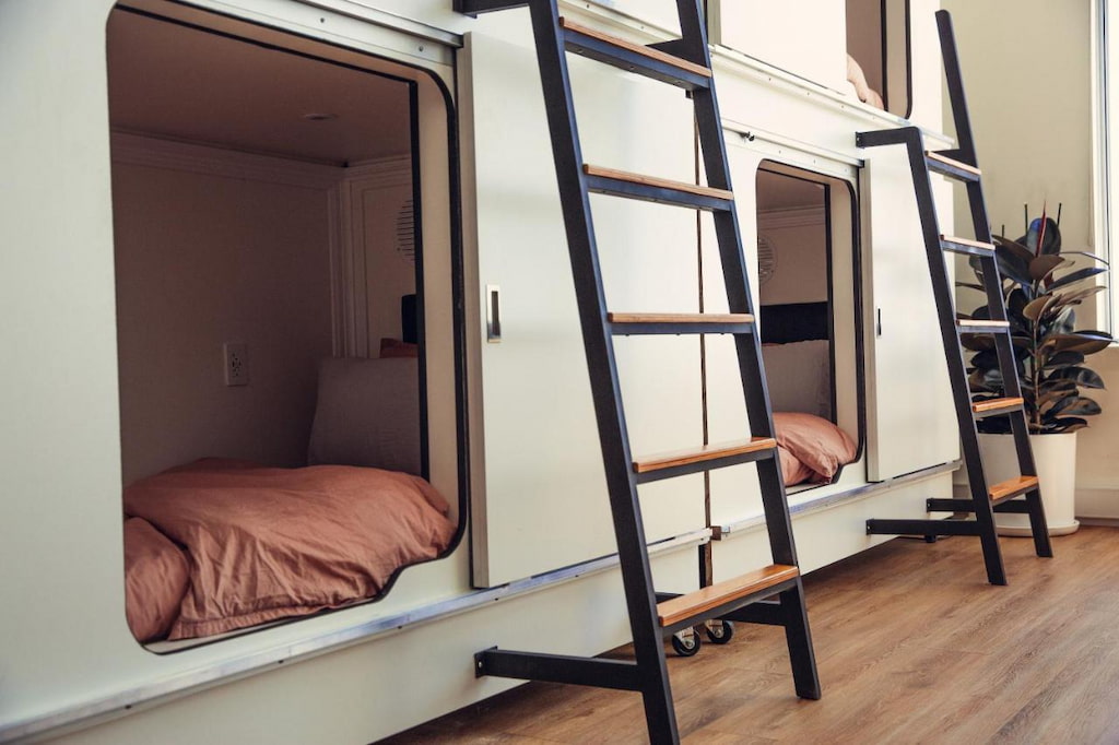 A unique hotel in Venice Beach with small cubicle rooms and ladders.
