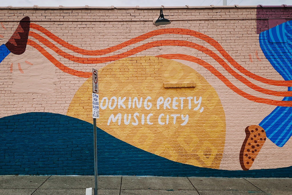 colorful mural that read 'Looking Pretty, Music City' in Nashville