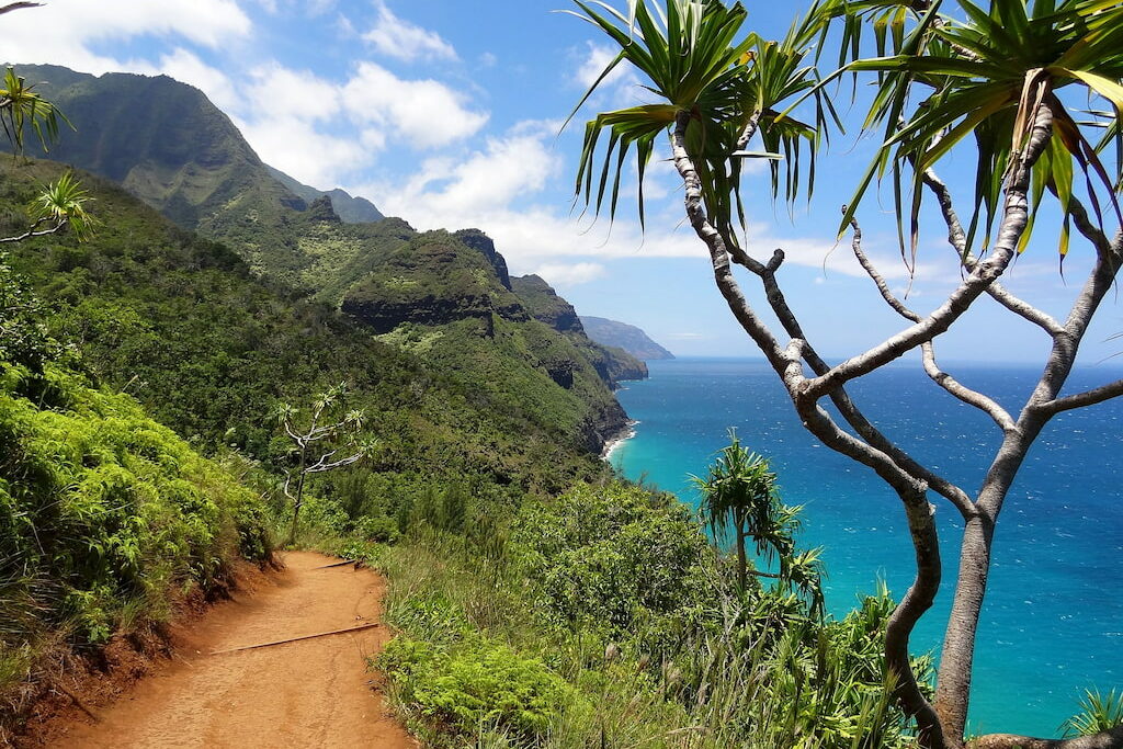 Napali coast with trail and blue waters is definitely not the worst time to visit Kauai, Hawaii