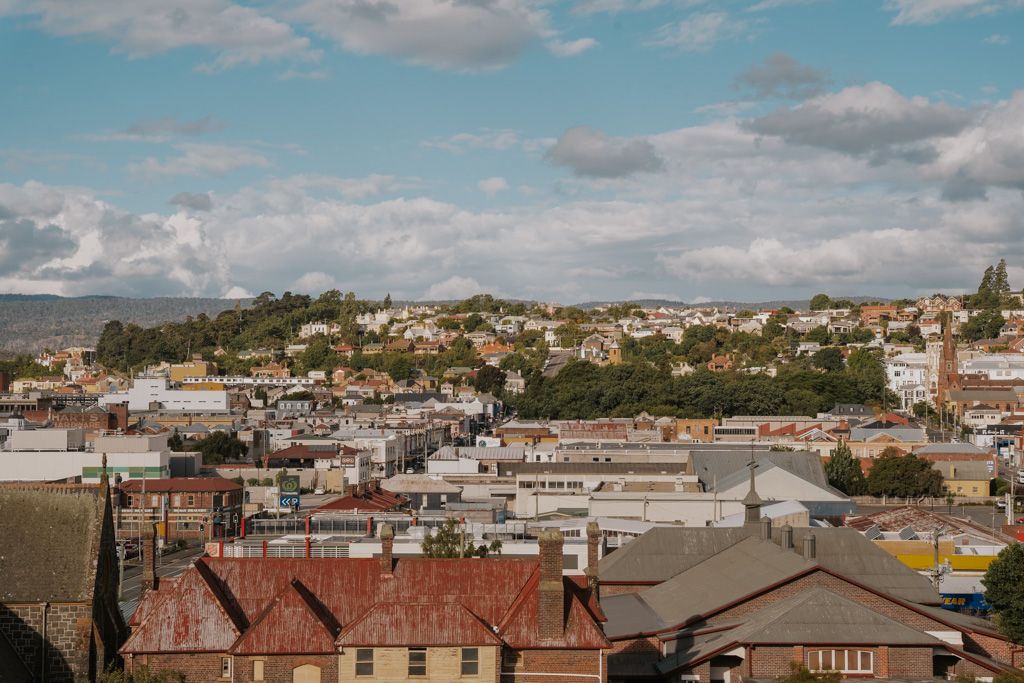 overlooking the downtown core of Launceston Tasmania with colourful low lying buildings and trees