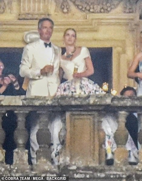 The happy couple enjoyed a champagne toast after their nuptials while watching fireworks from the balcony of the Italian villa in Rome