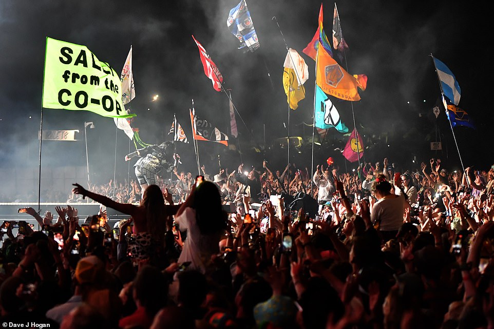 Glastonbury made a glorious return after three years as revellers resisted nationwide rail strikes and thunderstorm fears to bury memories of Covid. The stage is pictured last night