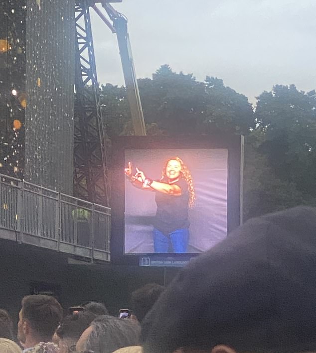 Two signers appeared on big screens last weekend (pictured) as they took turns to translate the star's 17-song setlist during her concerts at London 's Hyde Park as part of the British Summertime festival