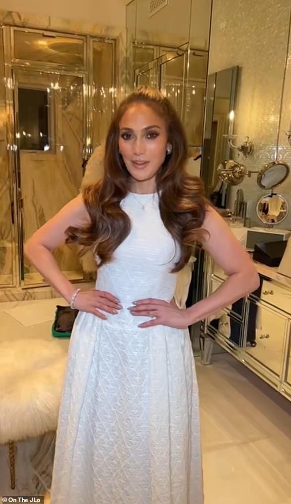 Blushing bride! JLo wore a quaint white dress in video posted to her newsletter. She appeared to be wearing two different white dresses in her post