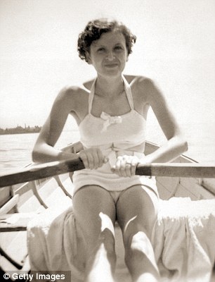 Braun in a rowboat on the Worthsee near Munich, 1937. Eva Braun had started a relationship with Adolf Hitler in 1931 and moved into his residency Berghof near Berchtesgaden in 1936