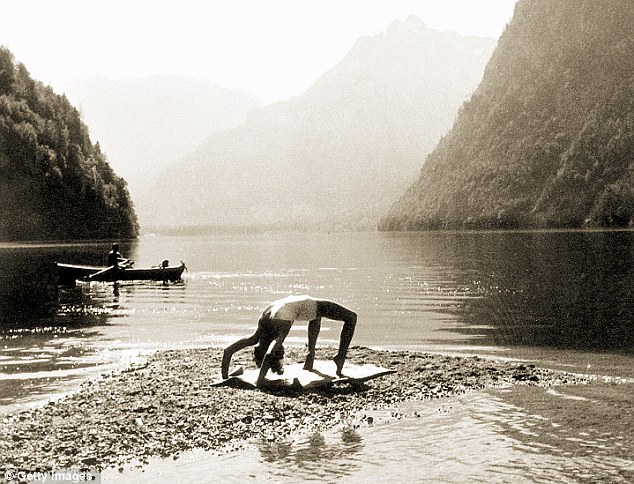 Braun exercising in her bathing suit at Konigssee, Berchtesgaden, Germany, 1942. Eva Braun liked to go swimming at the lake, which is only 4 miles from Adolf Hitler's Berghof, where she lived with the Nazi dictator