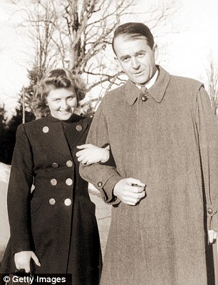 Eva Braun and architect Albert Speer walking together near Adolf Hitler's residence in 1940. Eva Braun had a close relationship with Speer who designed a logo for her