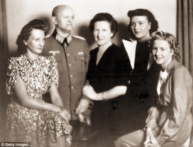 Eva Braun with her parents, Friedrich 'Fritz' and Franziska (centre) and her sisters Ilse (left) and Margarethe Gretl (second from right) in 1940