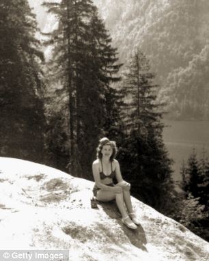 Sun lover: Eva Braun sunbathing at Konigssee in 1940, four miles from the Berghof, where she lived with Adolf Hitler