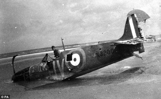 Stephenson had to ditch his plane after enemy bullets hit the radiator - forcing him to crash-land during Operation Dynamo. Above, a Nazi sits in the Spitfire