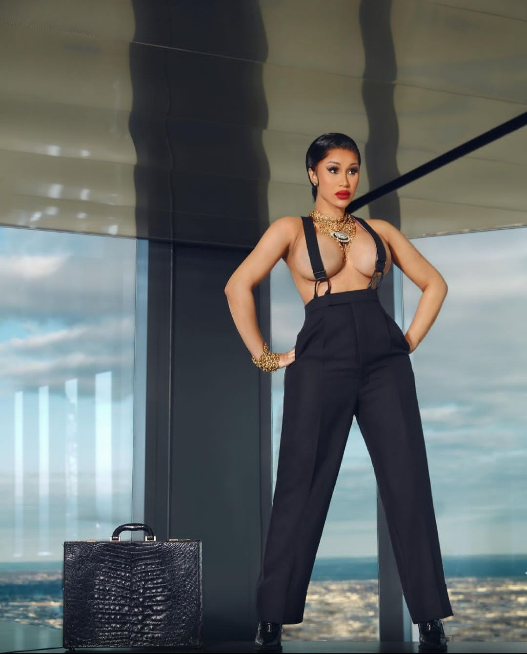 Cardi B goes topless and braless for XXL magazine shoot