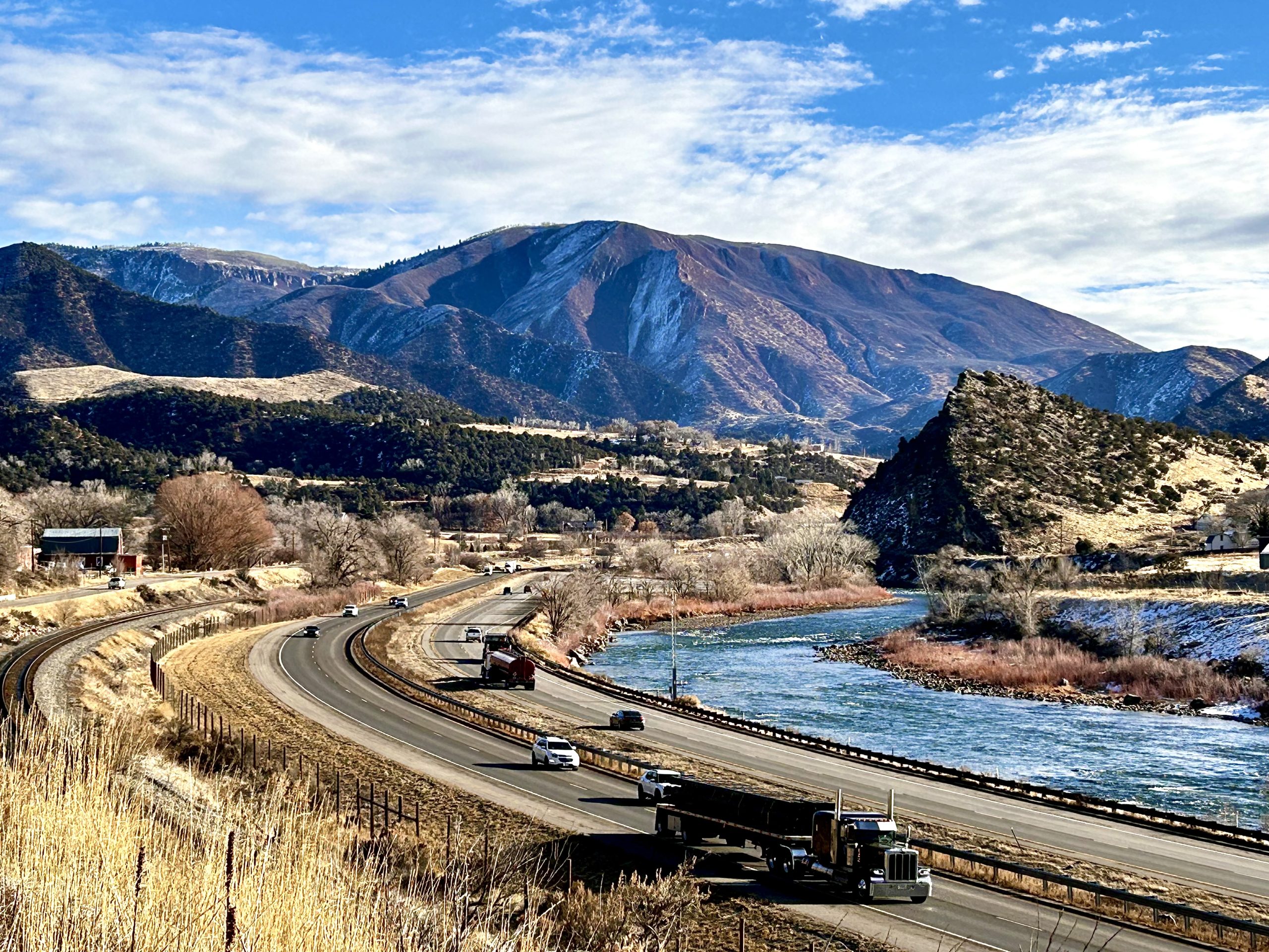 nterstate 70 follows the Colorado River through a transitional landscape between New Castle and Glenwood Springs.