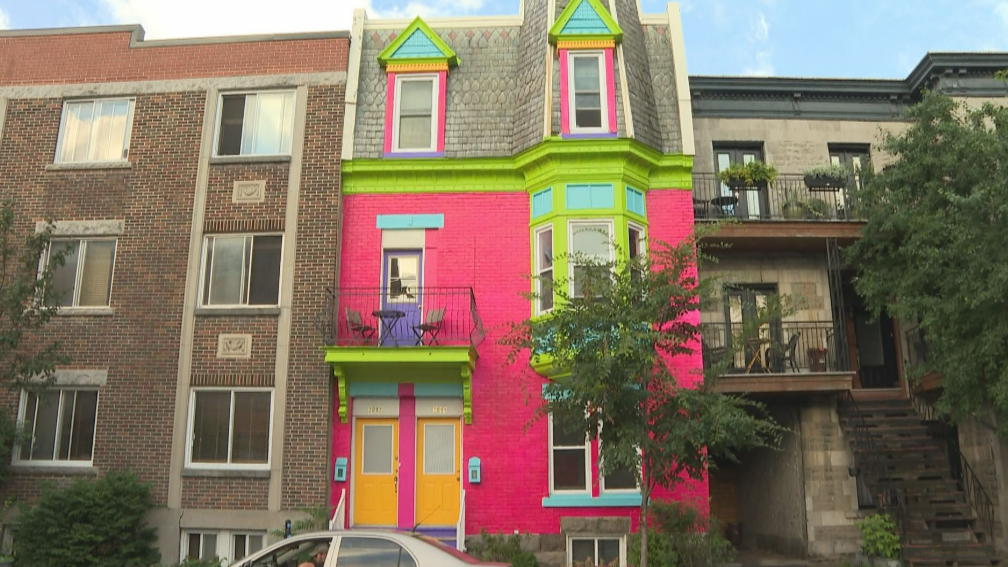 City of Montreal threatening action over garish painted home used as a giant billboard