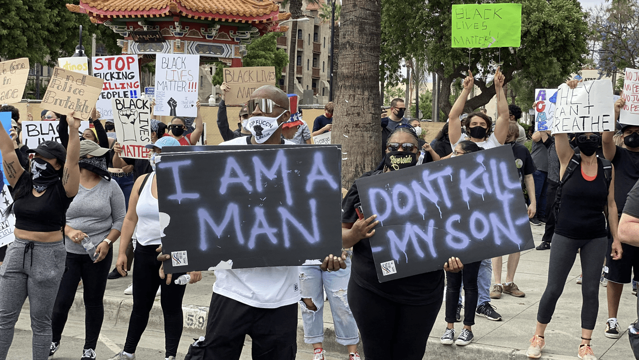 Protestors gather in downtown Riverside in the wake of the murder of 46-year-old George Floyd, who was killed by Derek Chauvin, a white Minneapolis police officer. Chauvin kneeled on Floyd’s neck for nine minutes and 29 seconds on May 25, 2020.