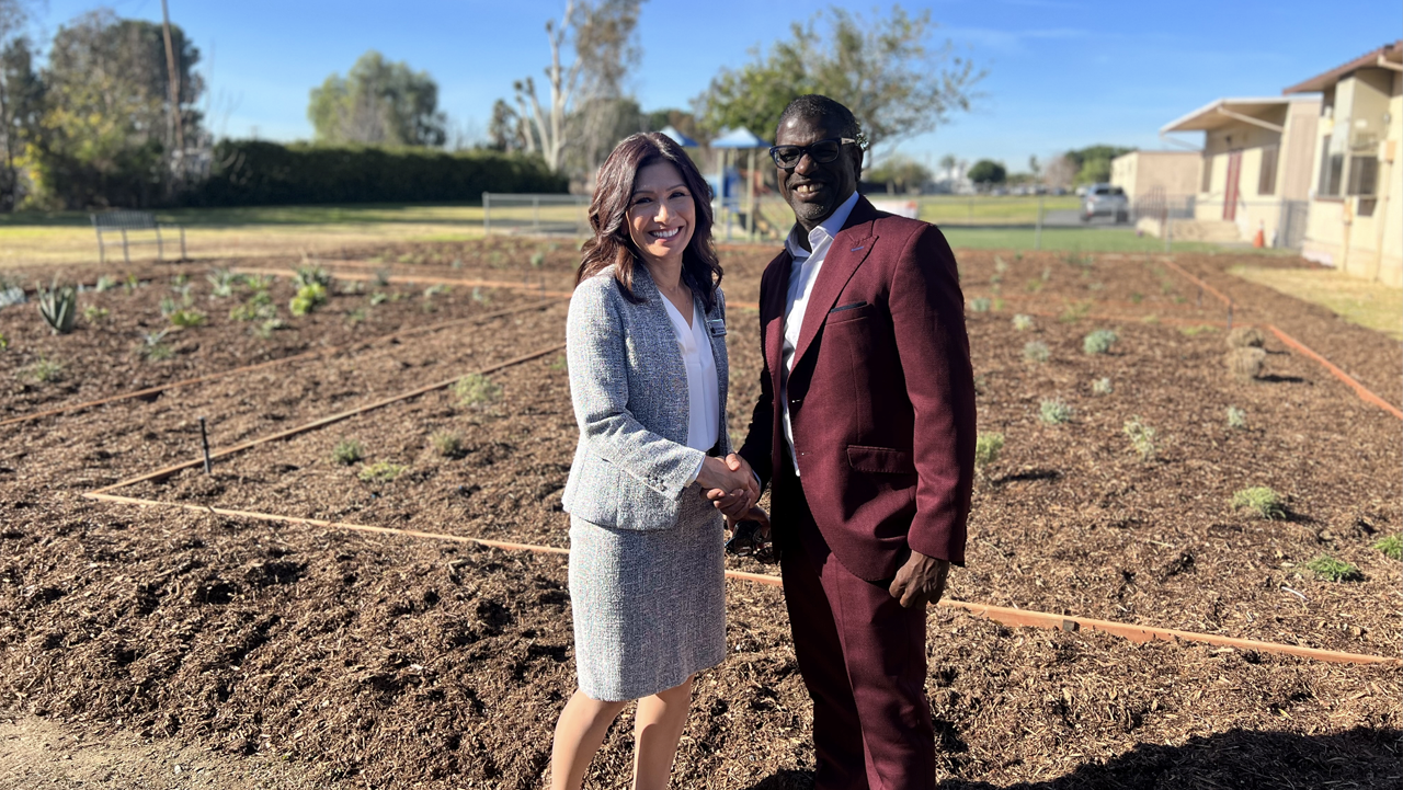 Miki Rene Inbody, Superintendent of Schools Fontana Unified School District (L) and Dr. Daniel Walker (R) stand before the O’Day Short Family Unity Garden at Randall Pepper Elementary School in Fontana, CA, on Friday, December 15, 2023. The Unity Garden was dedicated to commemorate the lives of O’Day, Helen, Barry and Carol Ann Short.